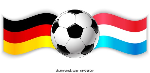 German and Luxembourgish wavy flags with football ball. Germany combined with Luxembourg isolated on white. Football match or international sport competition concept.