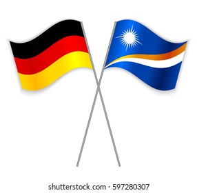 German and Marshallese crossed flags. Germany combined with Marshall Islands isolated on white. Language learning, international business or travel concept.