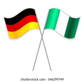 German and Nigerian crossed flags. Germany combined with Nigeria isolated on white. Language learning, international business or travel concept.