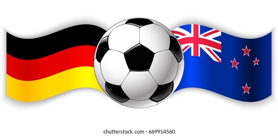 German and NZ wavy flags with football ball. Germany combined with New Zealand isolated on white. Football match or international sport competition concept.