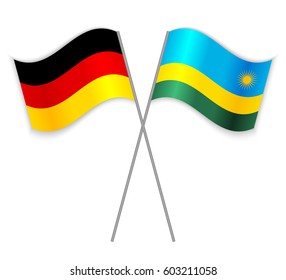 German and Rwandan crossed flags. Germany combined with Rwanda isolated on white. Language learning, international business or travel concept.