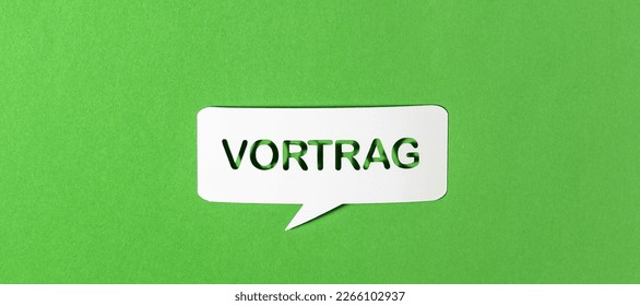 German text lecture in a paper speech bubble punched out on green paper background. Photorealistic vector in banner format.