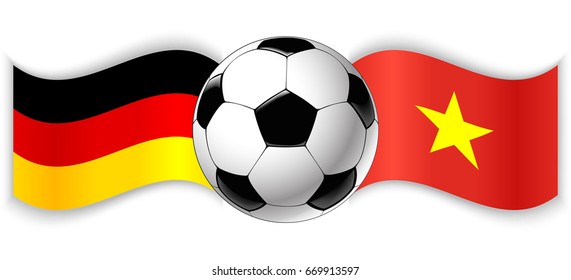German and Vietnamese wavy flags with football ball. Germany combined with Vietnam isolated on white. Football match or international sport competition concept.