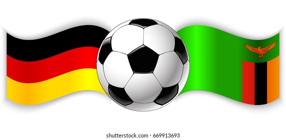 German and Zambian wavy flags with football ball. Germany combined with Zambia isolated on white. Football match or international sport competition concept.