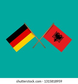 germany and Albania crossed flags.Language learning or travel concept.
