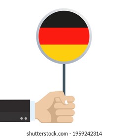 Germany circular flag. Hand holding round German flag. National symbol. Vector illustration. 