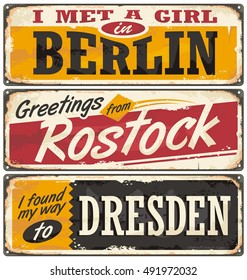 Germany cities and travel destinations. Retro metal plates set on old damaged background. Travel theme.