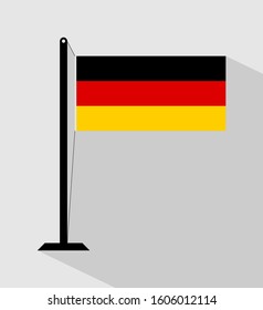 germany flag on pole, isolated on gray background