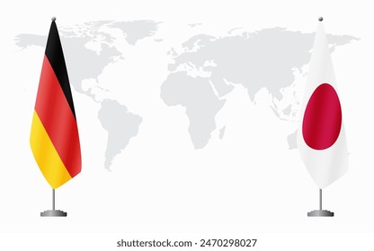 Germany and Japan flags for official meeting against background of world map.