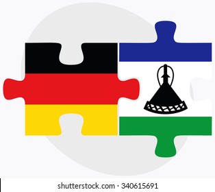 Germany and Lesotho Flags in puzzle isolated on white background