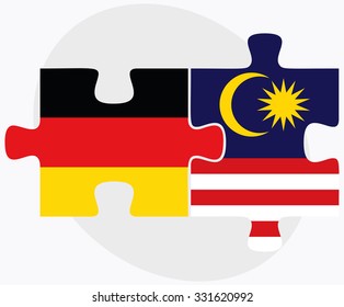 Germany and Malaysia Flags in puzzle isolated on white background