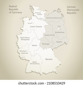 Germany map divided on West and East Germany with regions, and names map, old paper background vector