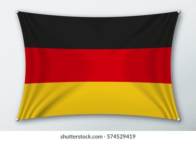 Germany national flag. Symbol of the country on a stretched fabric with waves attached with pins. Realistic vector illustration.