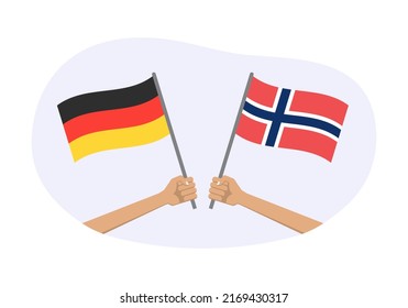 Banderas de Alemania y Noruega. Símbolos alemanes y noruegos. Mano sosteniendo la bandera ondeando. Ilustración vectorial.