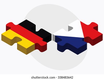 Germany and Sint Maarten Flags in puzzle isolated on white background
