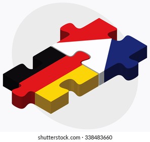 Germany and Sint Maarten Flags in puzzle isolated on white background