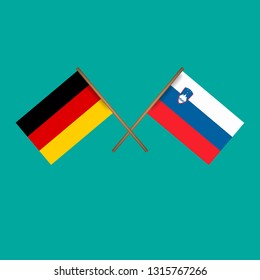 Germany and Slovenia crossed flags.Language learning or travel concept.