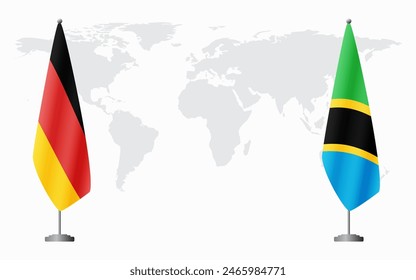 Germany and Tanzania flags for official meeting against background of world map.