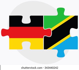 Germany and Tanzania Flags in puzzle isolated on white background