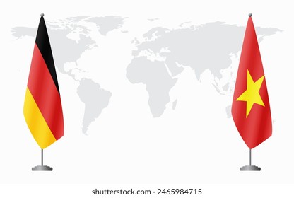 Germany and Vietnam flags for official meeting against background of world map.