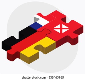 Germany and Wallis and Futuna Flags in puzzle isolated on white background