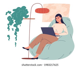 Ggirl sits at home with her laptop