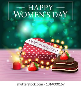 Ggreen greeting postcard for women's day with blurred background and gift in the shape of a heart