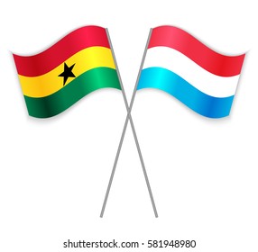 Ghanaian and Luxembourgish crossed flags. Ghana combined with Luxembourg isolated on white. Language learning, international business or travel concept.