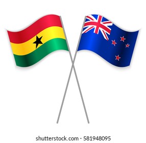 Ghanaian and NZ crossed flags. Ghana combined with New Zealand isolated on white. Language learning, international business or travel concept.