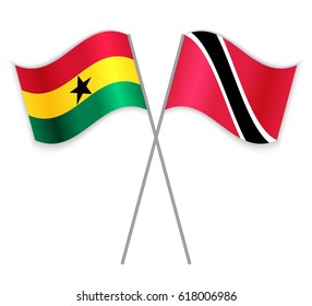 Ghanaian and Trinidadian crossed flags. Ghana combined with Trinidad and Tobago isolated on white. Language learning, international business or travel concept.