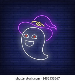 Ghost wearing witch hat neon sign. Halloween party, fear design. Night bright neon sign, colorful billboard, light banner. Vector illustration in neon style.