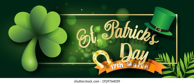 Giant shamrock plants with golden Horseshoe and Saint Patrick's Day letters, high hat and the day of event's ribbon on blurred and bokeh green background. 