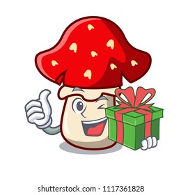 With gift amanita mushroom mascot cartoon