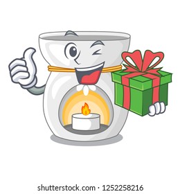 With gift aroma lamp with burning candle mascot
