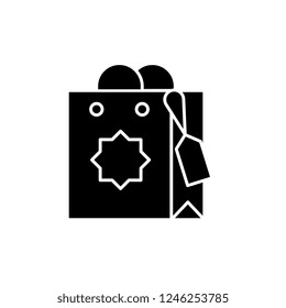 Gift bag black icon, vector sign on isolated background. Gift bag concept symbol, illustration 
