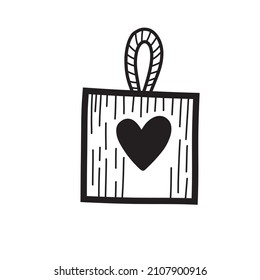 Gift bag icon in doodle style. Black and white hand drawn illustration. Gift with a heart for valentine's day