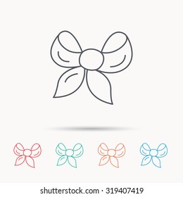 Gift bow icon. Present decoration sign. Ribbon for packaging symbol. Linear icons on white background. Vector