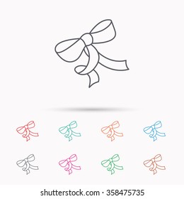 Gift bow icon. Present decoration sign. Ribbon for packaging symbol. Linear icons on white background.
