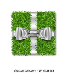 Gift box 3D. Green grass box top view, silver ribbon bow isolated white background. Nature friendly design. Eco packaging. Concept recycle. Organic lawn meadow. Holiday decoration Vector illustration