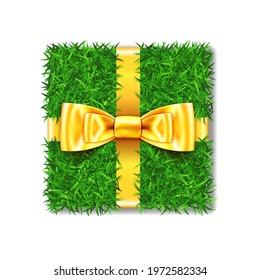 Gift box 3D. Green grass box top view, gold ribbon bow, isolated white background. Nature friendly design. Eco packaging. Concept recycle. Organic lawn, meadow. Holiday decoration Vector illustration
