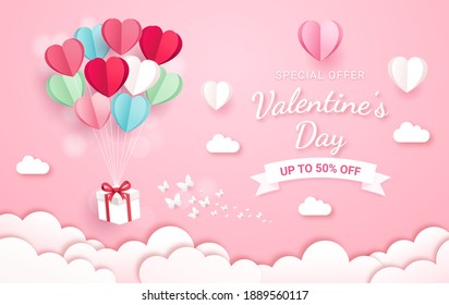 Gift box with balloon on sky paper cut style. Valentines day card background.