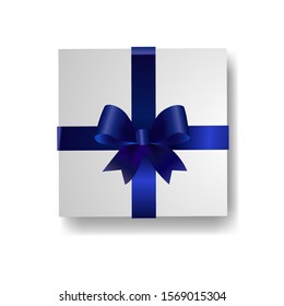 Gift box with blue bow for design decoration top view isolated on a white background