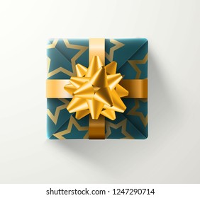 Gift box blue with golden shiny ribbons and bow. Golden star texture. On white background with realistic shadow. Object template design, banner poster, decoration, holiday New year, Christmas, Vector
