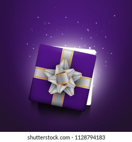 Gift box with bow, top view, glowing effect, vector background