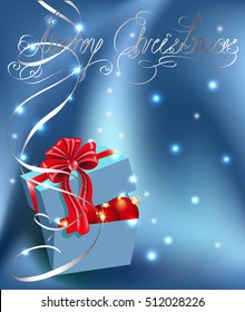 Gift box with Christmas decoration and silver serpentine 