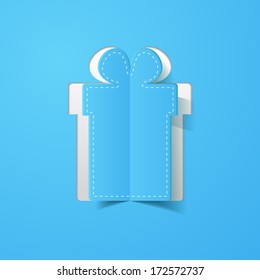 a gift box cut in paper