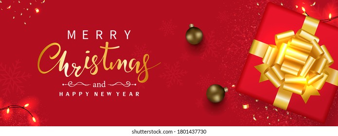 Gift box decorated with gold bow-ribbon, Christmas balls, Sparkling light, and confetti isolated on red background. Flat lay. Top view. Xmas banner. Luxury style. New year holiday.Vector illustration.