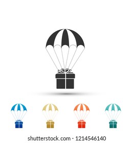 Gift box flying on parachute icon isolated on white background. Delivery service, air shipping concept, bonus concept. Set elements in colored icons. Flat design. Vector Illustration