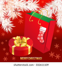 Gift box with gold bow and paper bag