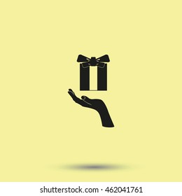 Gift box in hand.